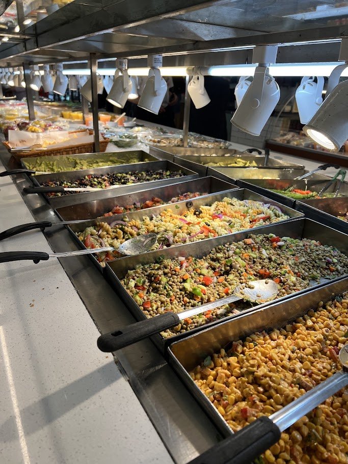 Buffet counter with prepared food trays